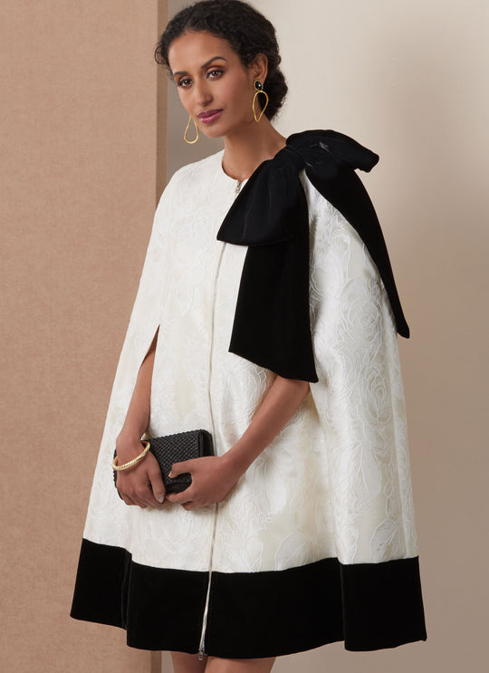 Vogue Schnittmuster V2133 Kurzes Cape und tailliertes Kleid mit abnehmbarer Schleife für Damen
