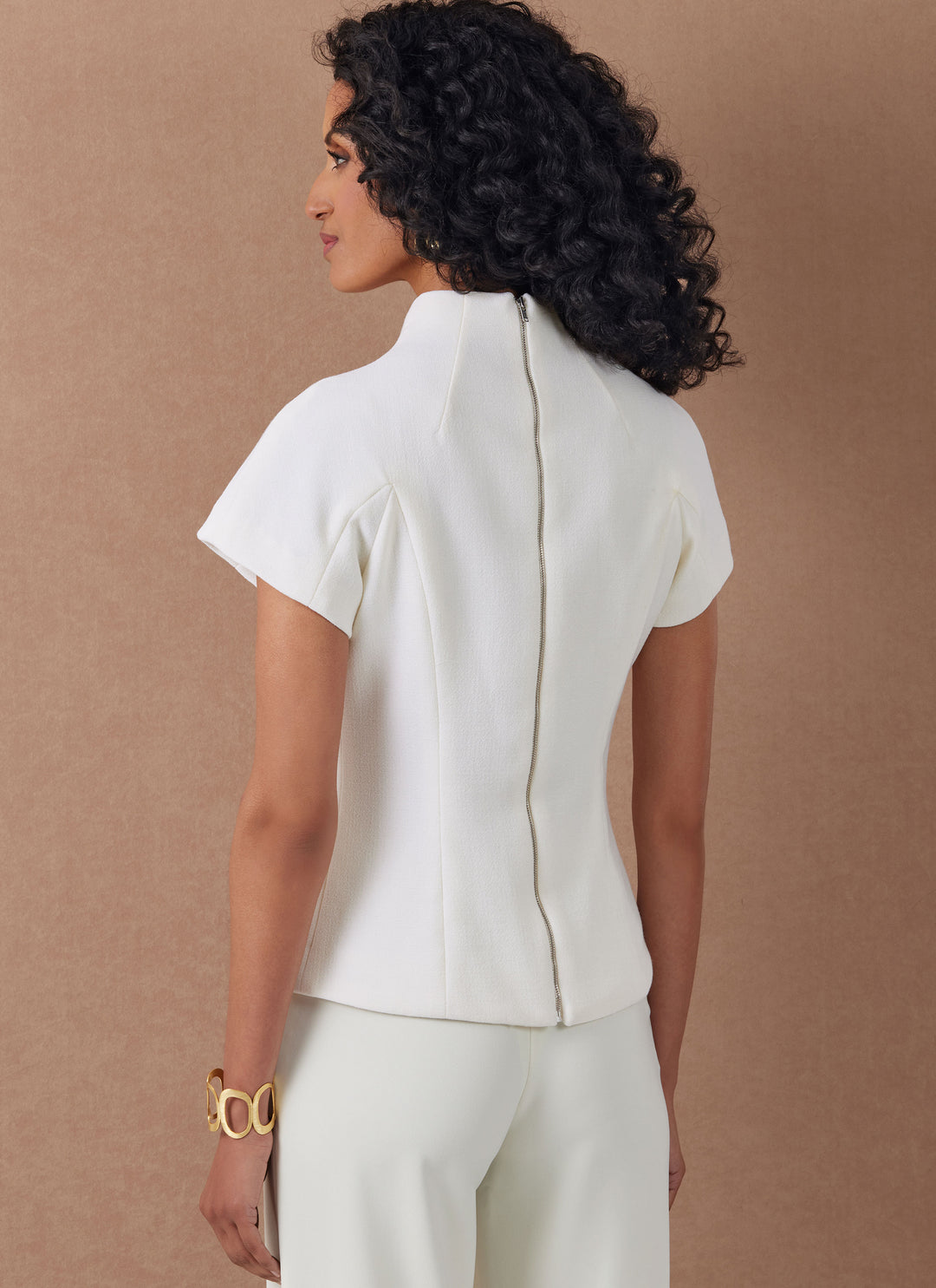 Vogue Schnittmuster V2134 Oberteil mit verschiedenen Ärmelvarianten für Damen und zierliche Damen